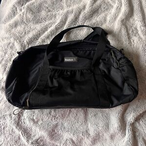 Reebok Black Duffel Bag with Dual Handles and Shoulder Strap